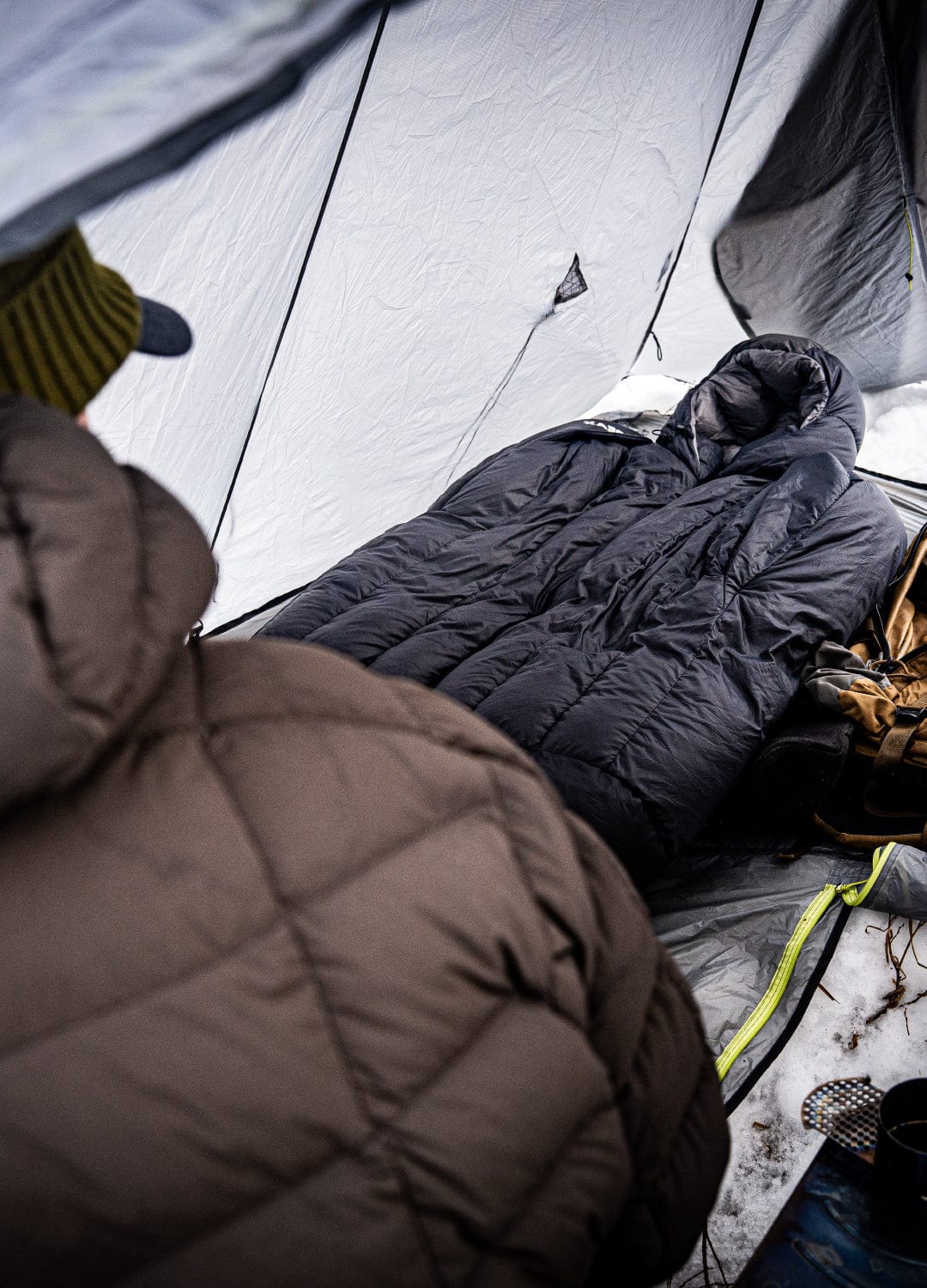 The Solace 15° Sleeping Bag is the ultimate backcountry sleep system—designed for side sleepers, belly sleepers, and hunters who demand real recovery in the field. With 850+ fill hydrophobic down, stretch baffles, and patented arm-free ports, it's more than just a warm lightweight sleeping bag. It’s the best sleeping bag for hunting because it helps you recover faster, sleep better, and hunt harder. When the mountains demand your best, quality sleep isn’t optional—it’s your edge.